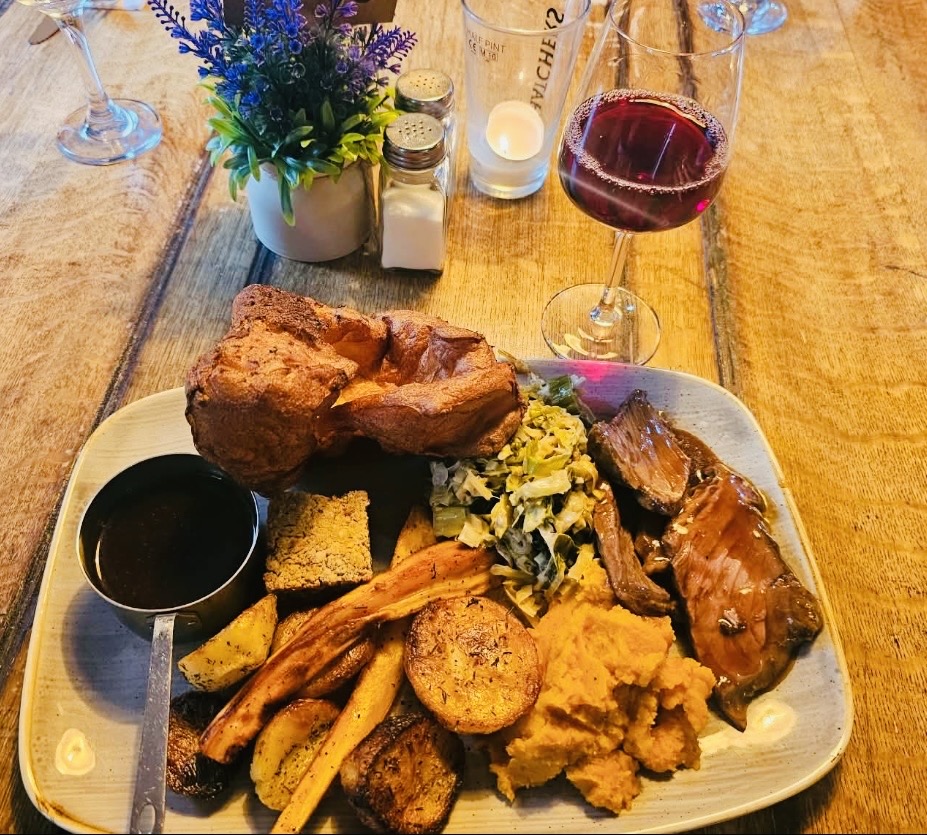 Sunday roast with Yorkshire pudding, roast beef, vegetables and gravy at The Ilchester Arms